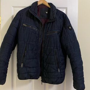 Men’s diesel coat. In new condition. Barely worn. Size Large.